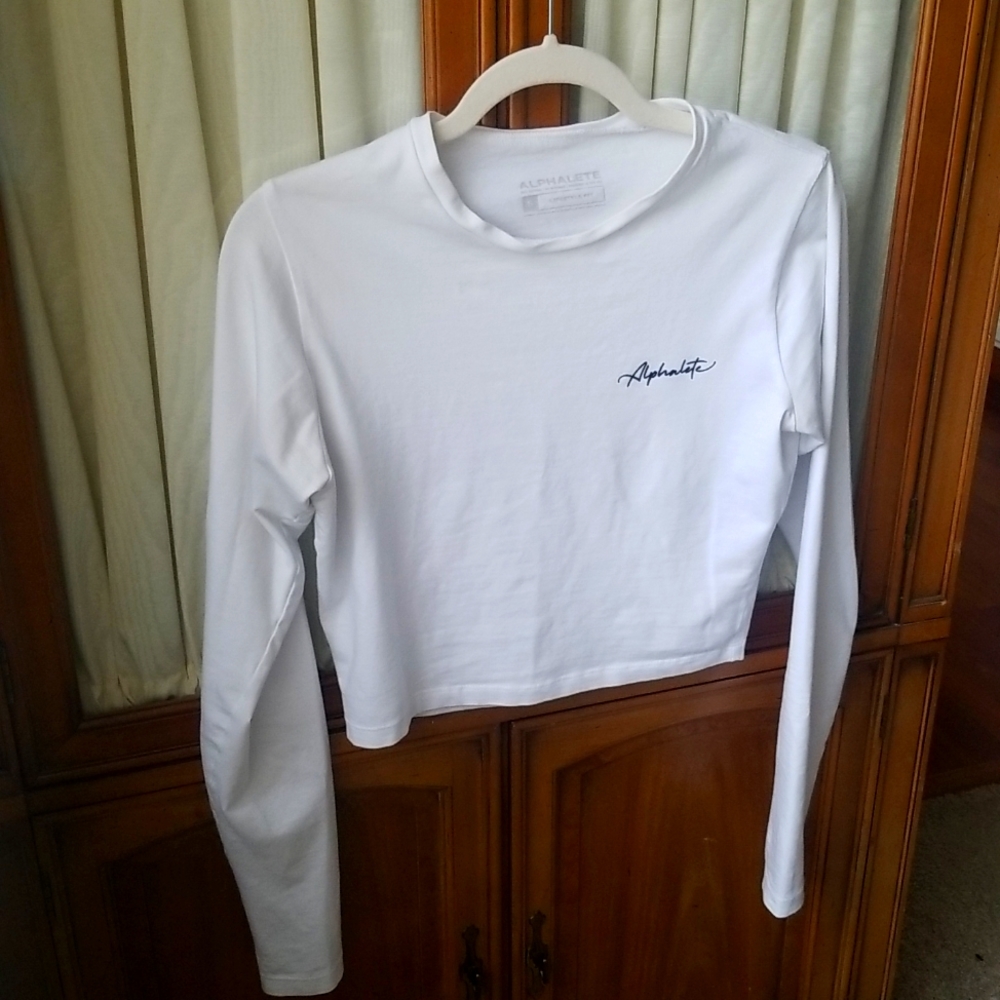 Alphalete Long Sleeve Crop Tee in White - Signature Fit